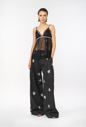 BLACK/WHITE Pinko Reimagine orchid-print wide-leg trousers by Patrick McDowell | LMYTR14076