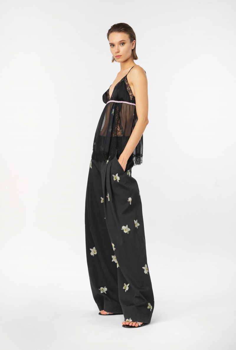 BLACK/WHITE Pinko Reimagine orchid-print wide-leg trousers by Patrick McDowell | LMYTR14076